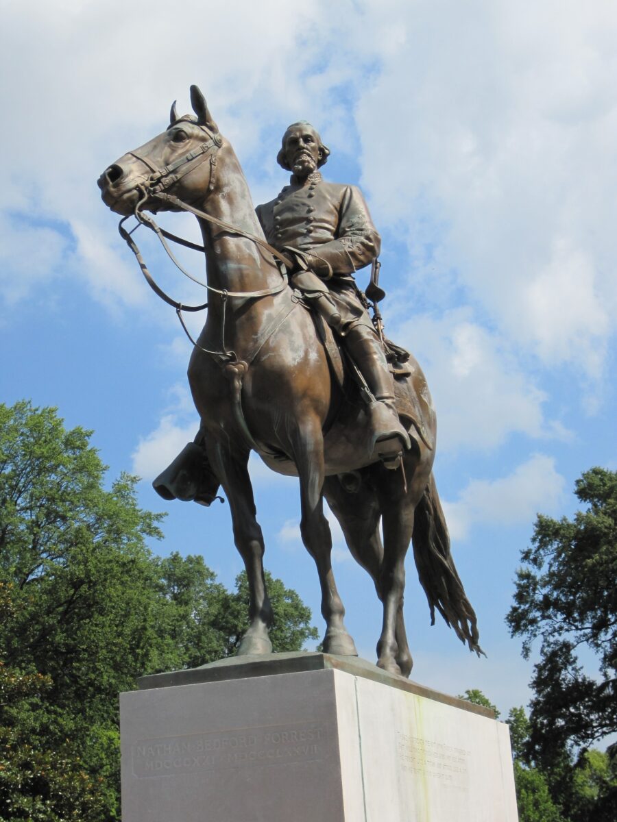 A statue of Confederate Gen. Nathan Bedford Forrest, a founding member of the Ku Klux Klan, on its former pedestal in Health Sciences Park in Memphis